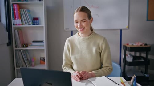 Enthusiastic Woman Teacher Explains Lesson Online