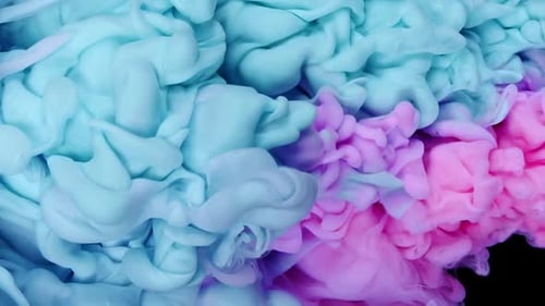 Abstract Blue and Pink Ink Clouds Swirling