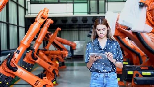 Tech industry. Business industry technology, people and tech. Engineer working in factory.