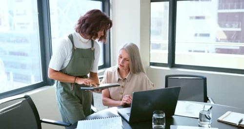 Business team, tablet and planning strategy while talking and having discussion about digital