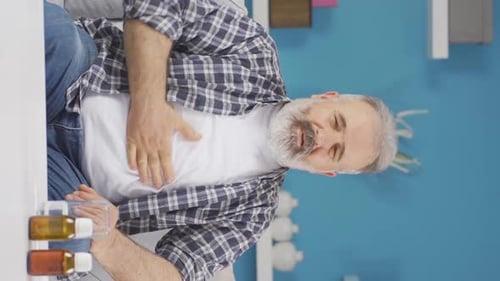 Vertical video of To vomit.