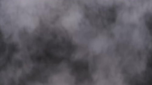 Weißer Rauch oder Dampf auf schwarzem Hintergrund