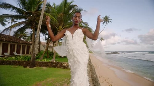Model Posing in Wedding Gown on Tropical Beach