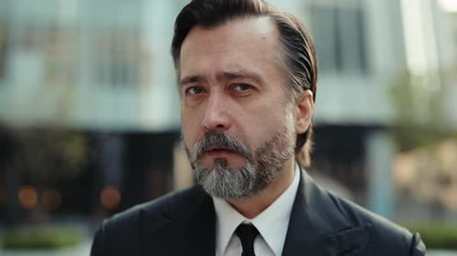 Close-up of a Mature Man in a Suit