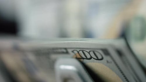 Macro View of Automatic Money Counting Close Up. Electronic Modern Counter Calculating