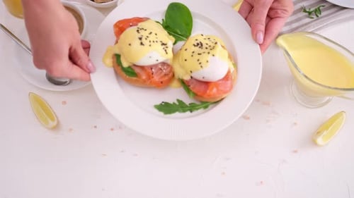 Tasty Benedict Egg Breakfast Salmon Fillet Sandwich with Cream Cheese and Poached Egg at Domestic