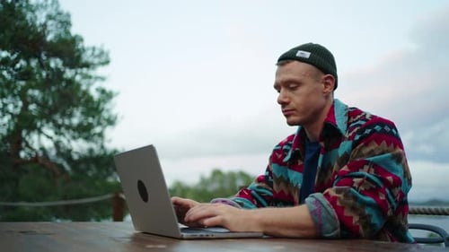 Web Developer Working Online Portrait Of Man With Laptop On Terrace With Beautiful Landscape