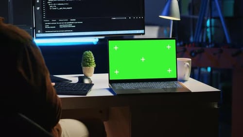 Mockup Laptop on Desk Where Software Engineer Writes Lines of Code