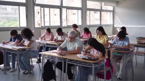 Students Studying Together in Bright Classroom