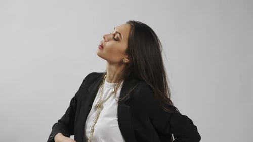 Model and Production Team in the Studio Close Up Shot Attractive Female Model in Elegant Suit with