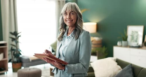 Business, face and mature woman with tablet in office for schedule, networking or review proposal