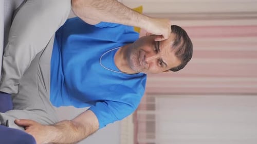 Vertical video of Man thinking about happy memories.