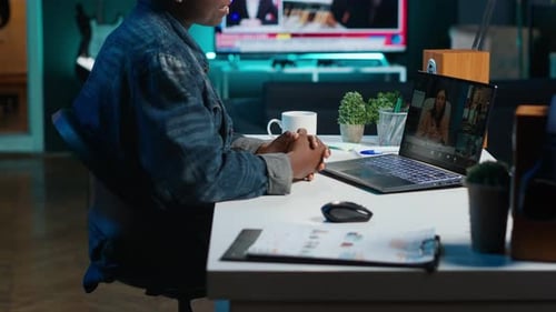 Young Adult in Video Conference at Home