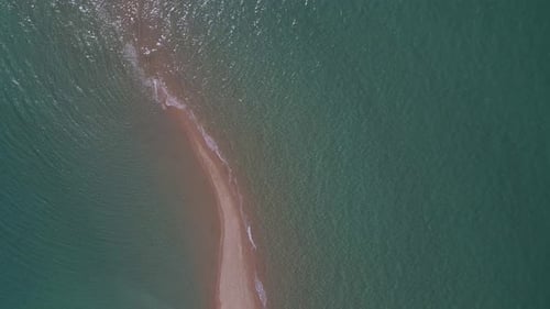 4k ovehead clip over a peninsula on the tropical beach of Epanomi, Halkidiki, Greece