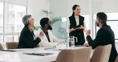 Diverse Colleagues Collaborate in Bright Modern Workplace