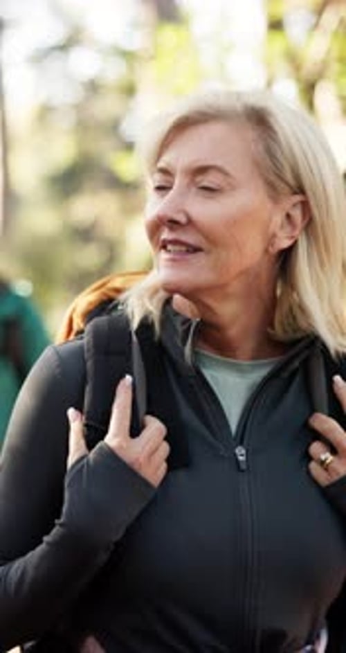 Hiking, senior couple and woman in woods for walking, sightseeing and adventure together
