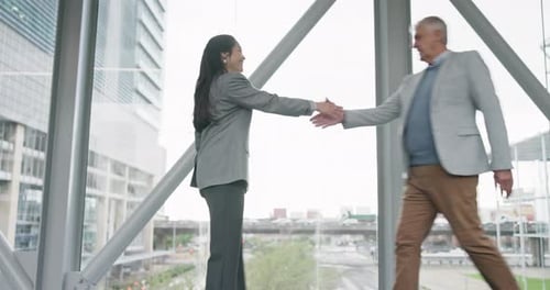 Business People Handshake Meeting in Modern Walkway