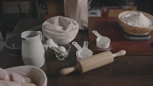 Baking Ingredients and Utensils on Wooden Table