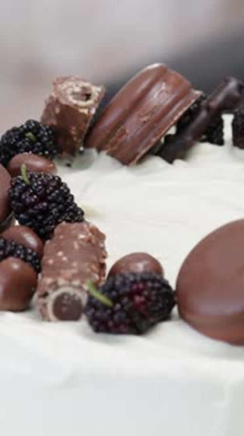 Decorated Chocolate Cake with Berries and Candies