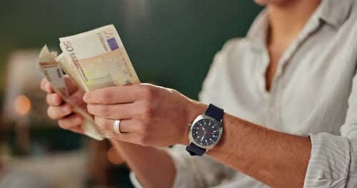 Man, hands and counting money in office for finance, notes and currency for budget planning