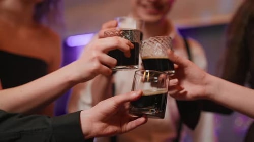 Young People Clinking Glasses on Party Close Up Hands of Young Men Woman Toasting and Drinking