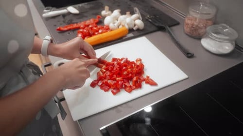 Chopping Red Pepper for Cooking at Home