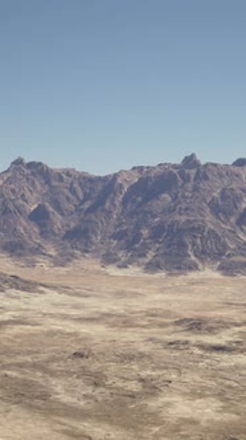 A View of a Mountain Range From an Airplane