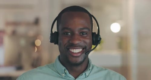Call center face, professional and happy black man, consultant or advisor smile for telemarketing