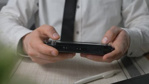 Office Manager Play on Handheld Game Console