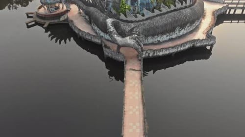 Big dragon at Thuy Tien lake Abandoned Water Park Vietnam, aerial