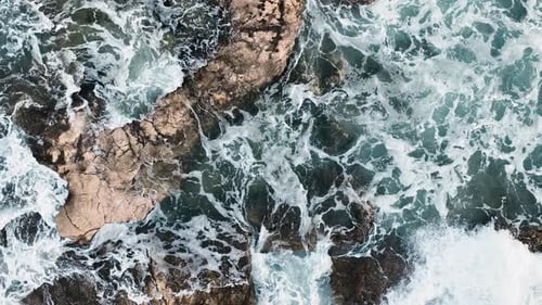 waves hitting the rocks