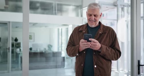 Happy, phone and businessman in office with networking, communication or contact with email