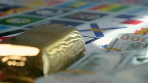 Gold Bar and Bundled Hundred Dollar Bills