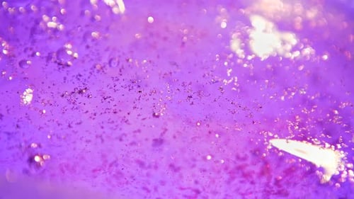 Dynamic Shifting Glitter Liquid Bokeh Background