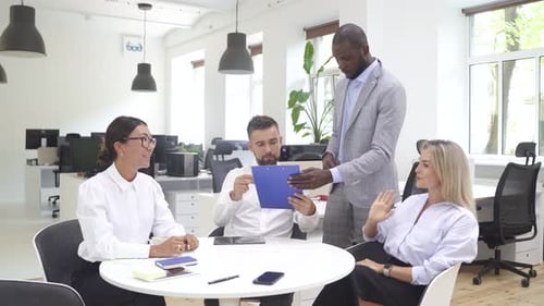 Multiethnic Business People During Meeting in Modern Office