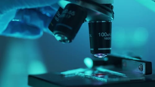 Closeup of Scientific Microscope Laboratory in Hospital Epidemic Disease Healthcare Vaccine Research