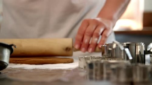 Rolling Dough for Cookies on a Table