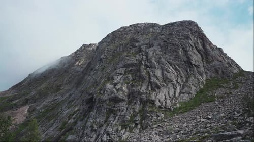 Steep Rugged Face Of A Mountain In Kvaenan, Norway. Close up