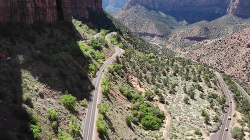 Twisty Road on Scenic Route in Zion National Park, Utah, USA. Drone Aerial View of Pass in Desert La