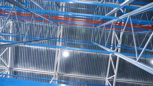 Expansive empty warehouse interior with metal shelves ready for distribution
