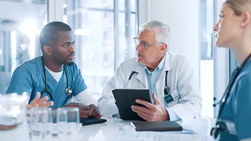 Medical, mature or doctors in meeting with tablet, planning or health treatment results in hospital