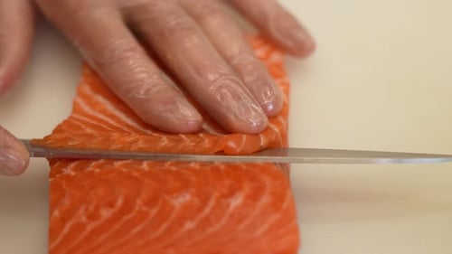Slicing Fresh Salmon Fillet with a Knife