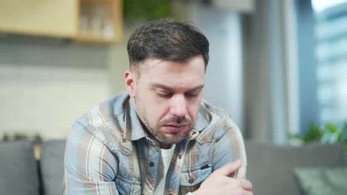 Man Crying, Coughing and Wiping Nose Inside