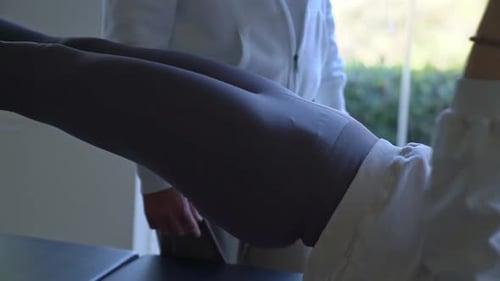 Pilates Exercise with Spring Resistance Machine in Studio