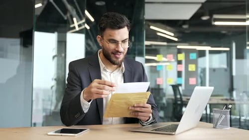 Man Receives Good News at Modern Office