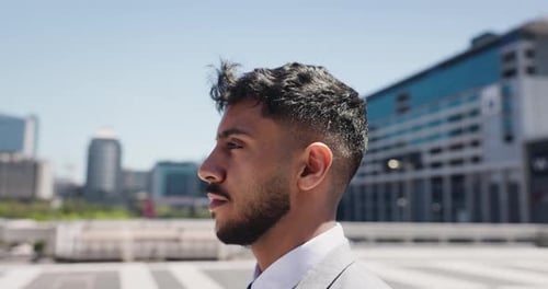 Business, walking and man in city, thinking and ideas with wonder, confidence and urban town