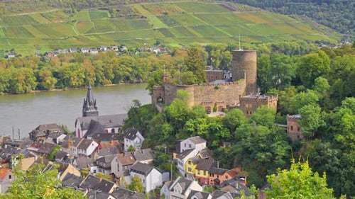 Panoramic aerial view of the small town of Niederheimbach on the Rhine River & the surrounding hills