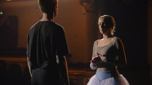 Ballerina Talking with an Associate on Stage