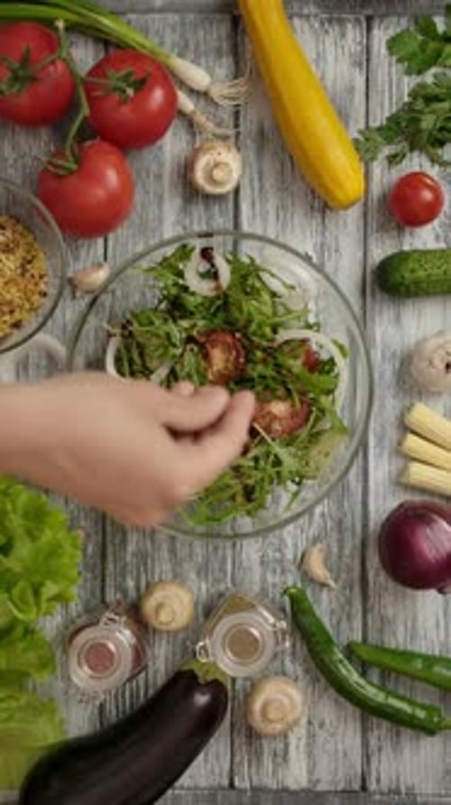 Seasoning Salad Ingredients on White Wooden Table