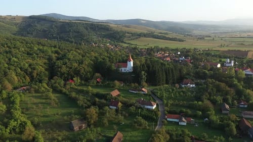 Flying Above Countryside Village Houses. Aerial drone View, Bikfalva, Bicfalau, Szeklerland, Romania